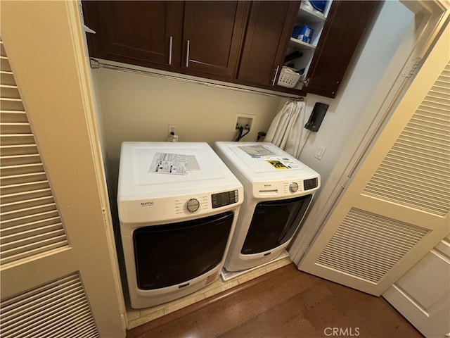326 Borden Rd, San Marcos, CA 92069 - laundry area featuring cabinet space, washer and clothes dryer, and dark wood-type flooring