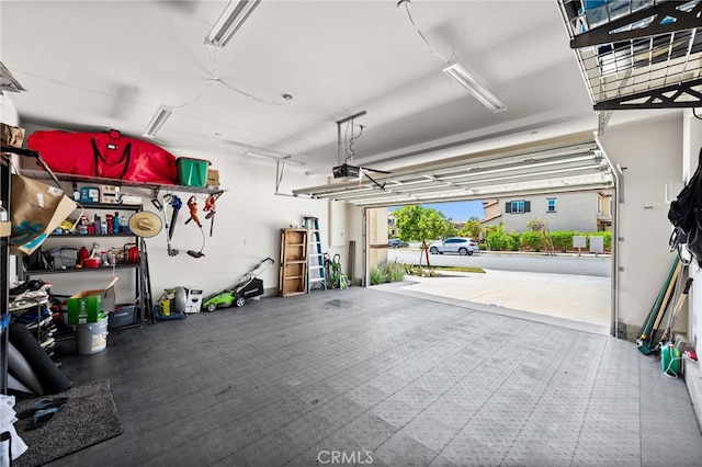 5609 Garibaldi Way, Fontana, CA 92336 - garage with a garage door opener