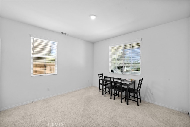 5609 Garibaldi Way, Fontana, CA 92336 - dining space featuring carpet and baseboards