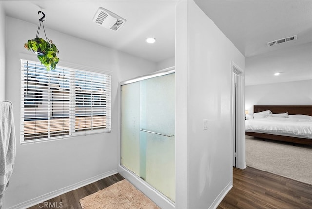 5609 Garibaldi Way, Fontana, CA 92336 - full bathroom with ensuite bath, wood finished floors, a stall shower, and recessed lighting
