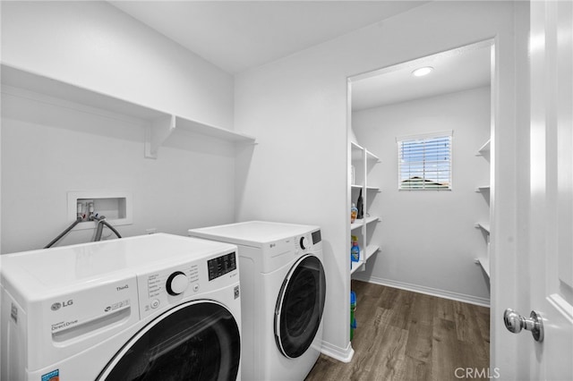 5609 Garibaldi Way, Fontana, CA 92336 - washroom featuring washing machine and clothes dryer and wood finished floors