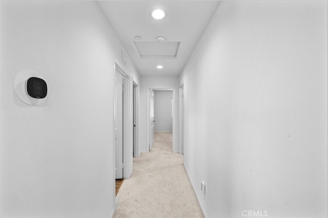 5609 Garibaldi Way, Fontana, CA 92336 - hallway featuring light colored carpet, recessed lighting, and attic access