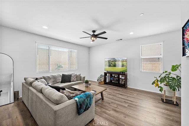 5609 Garibaldi Way, Fontana, CA 92336 - living area featuring ceiling fan, wood finished floors, and recessed lighting