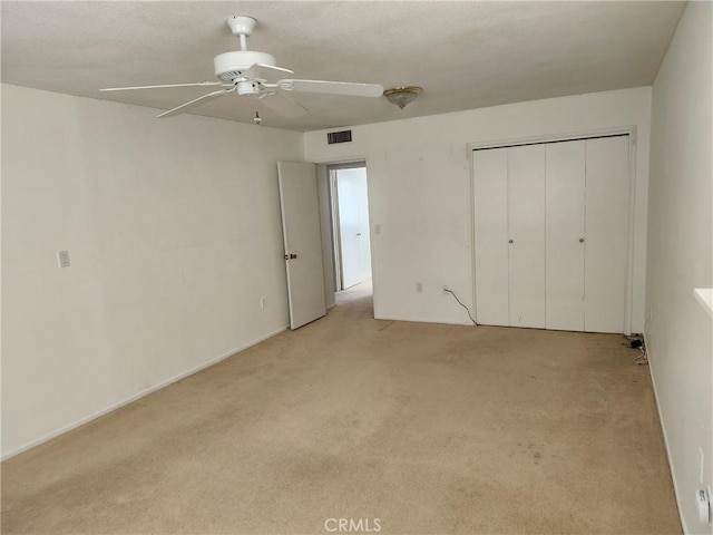 28635 Middlebury Way, Menifee, CA 92586 - unfurnished bedroom with light colored carpet, a ceiling fan, and a closet