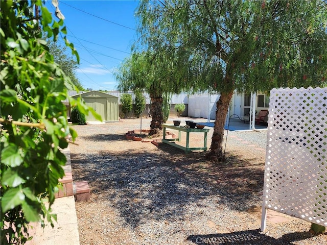 28635 Middlebury Way, Menifee, CA 92586 - fenced backyard with a shed and a patio area