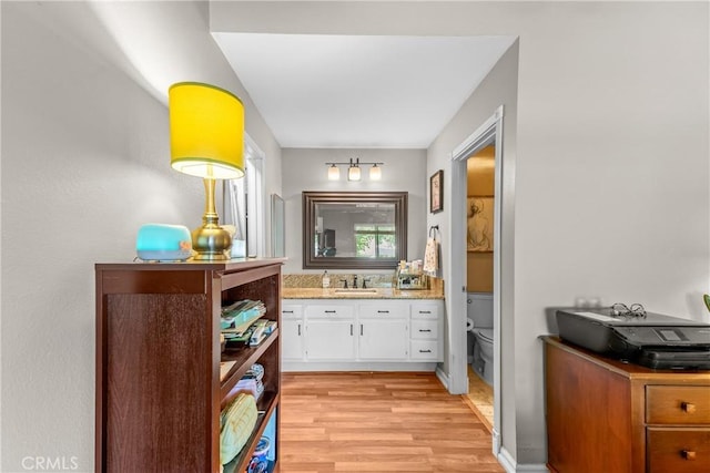 6210 Hartford Rd Unit 201, Yorba Linda, CA 92887 - bathroom featuring wood finished floors and vanity