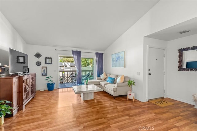 6210 Hartford Rd Unit 201, Yorba Linda, CA 92887 - living room with light wood-style floors and high vaulted ceiling