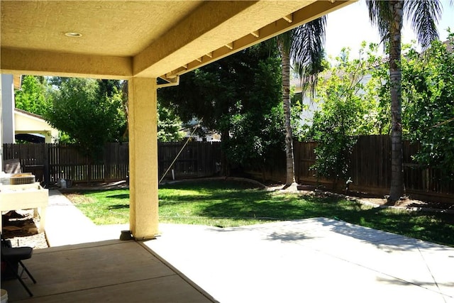 3569 Sepulveda Ave, Merced, CA 95348 - fenced backyard with a patio area