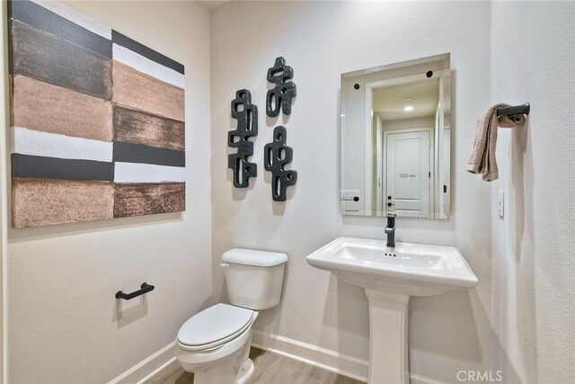 3091 Orchard Gln, Escondido, CA 92026 - half bath with toilet and wood finished floors