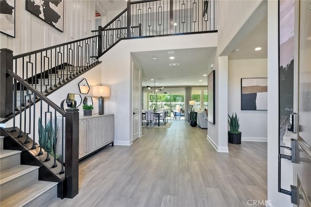 3091 Orchard Gln, Escondido, CA 92026 - entrance foyer featuring wood finished floors, stairway, a high ceiling, and recessed lighting