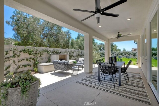 3091 Orchard Gln, Escondido, CA 92026 - fenced backyard featuring a ceiling fan, a patio area, outdoor dining space, and outdoor lounge area