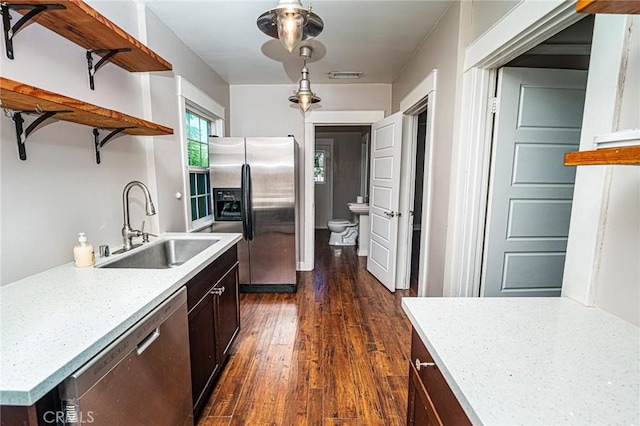 220 Palm Pl, Pomona, CA 91767 - kitchen with stainless steel appliances, open shelves, light countertops, dark wood-style floors, and dark brown cabinets