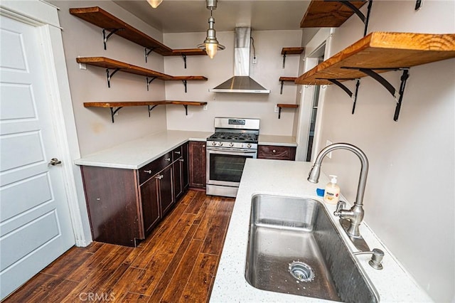 220 Palm Pl, Pomona, CA 91767 - kitchen with stainless steel range with gas cooktop, open shelves, wall chimney exhaust hood, dark wood-style floors, and dark brown cabinetry
