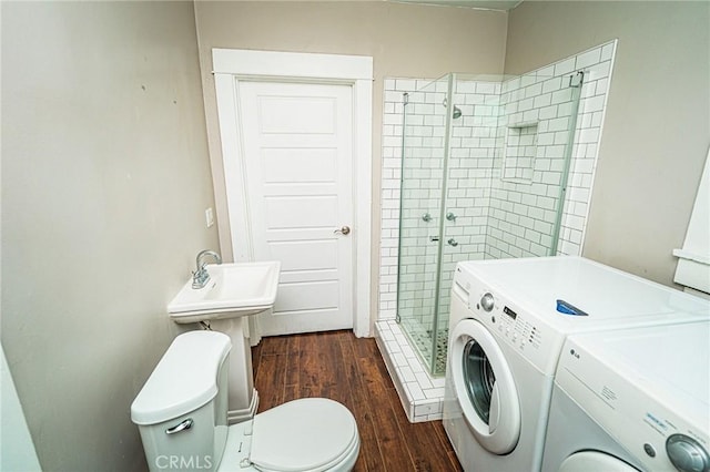 220 Palm Pl, Pomona, CA 91767 - full bath with independent washer and dryer, a stall shower, and wood finished floors