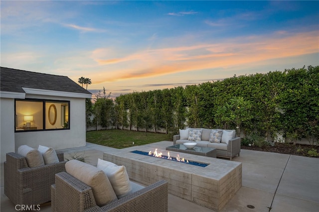 1700 Irvine Ave, Newport Beach, CA 92660 - patio terrace at dusk featuring a patio area and an outdoor living space with a fire pit
