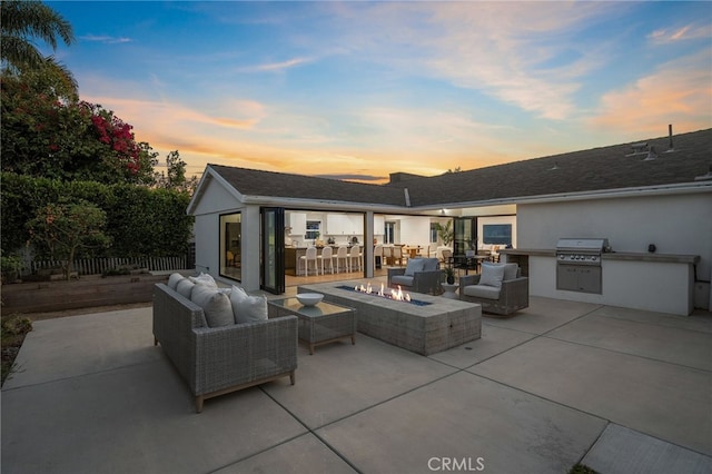 1700 Irvine Ave, Newport Beach, CA 92660 - view of patio with area for grilling and an outdoor living space with a fire pit