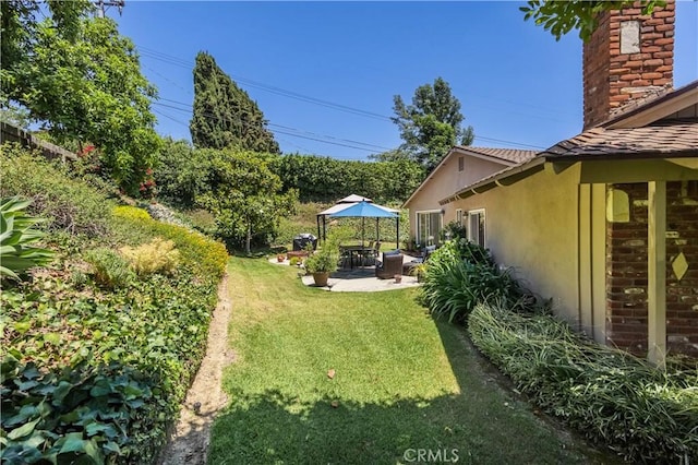 2526 Fontezuela Dr, Hacienda Heights, CA 91745 - view of grassy yard with a patio area