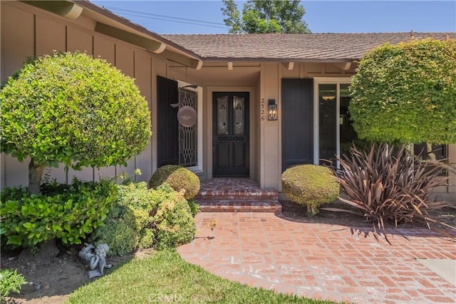 2526 Fontezuela Dr, Hacienda Heights, CA 91745 - property entrance with board and batten siding and roof with shingles
