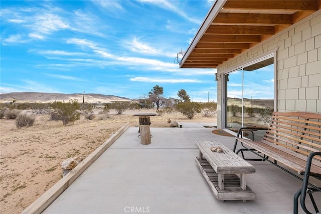 2570 N Deer Trl, Landers, CA 92285 - view of patio / terrace with a mountain view