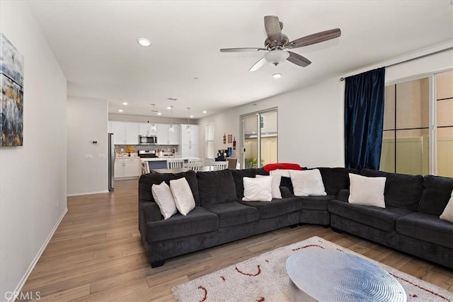 955 W Jasmine Way, Rialto, CA 92376 - living area featuring light wood-style floors, recessed lighting, and ceiling fan