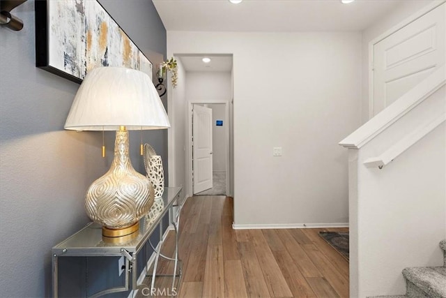 955 W Jasmine Way, Rialto, CA 92376 - hall with wood finished floors, recessed lighting, and stairway