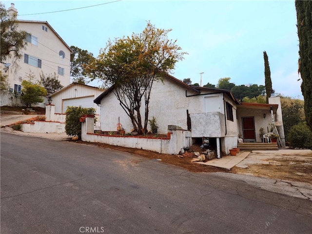 11860 W Trail Trail, Sylmar, CA 91342 - view of front of property featuring a garage
