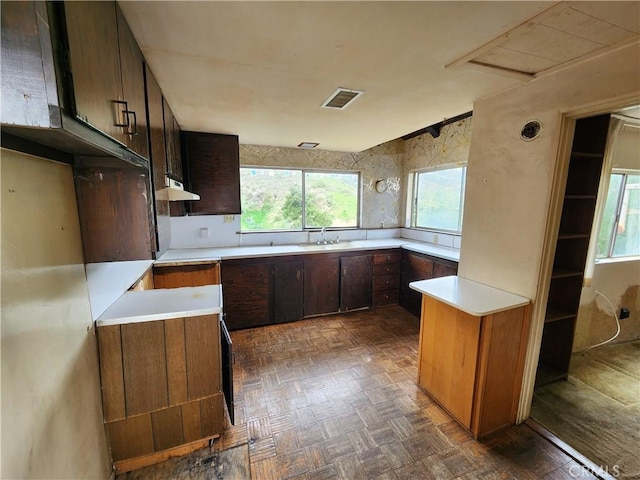 11860 W Trail Trail, Sylmar, CA 91342 - kitchen with under cabinet range hood and light countertops