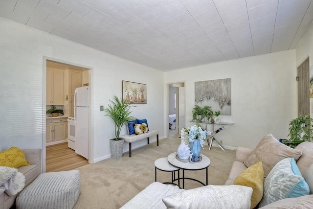 4693 71st St, La Mesa, CA 91942 - living area featuring light carpet and baseboards