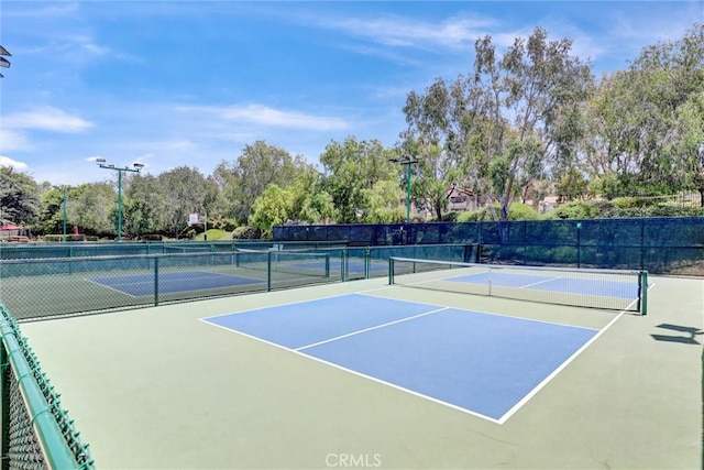 25072 Leucadia St Unit E, Laguna Niguel, CA 92677 - view of tennis court featuring community basketball court and view of scattered trees