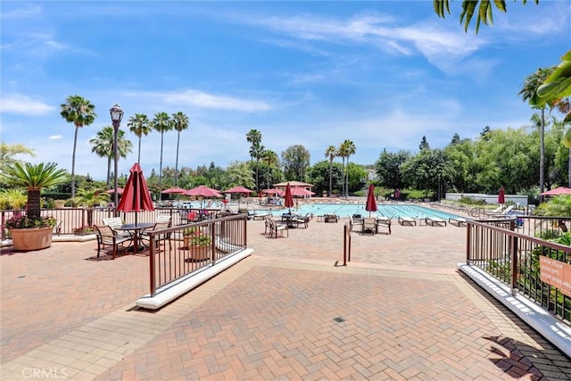 25072 Leucadia St Unit E, Laguna Niguel, CA 92677 - surrounding community with a patio area and a swimming pool
