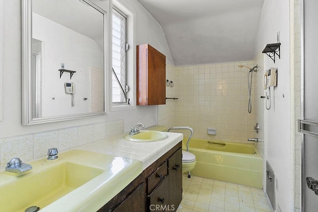 3431 Caspian Ave, Long Beach, CA 90810 - bathroom featuring lofted ceiling, double vanity, shower / washtub combination, and tile patterned floors