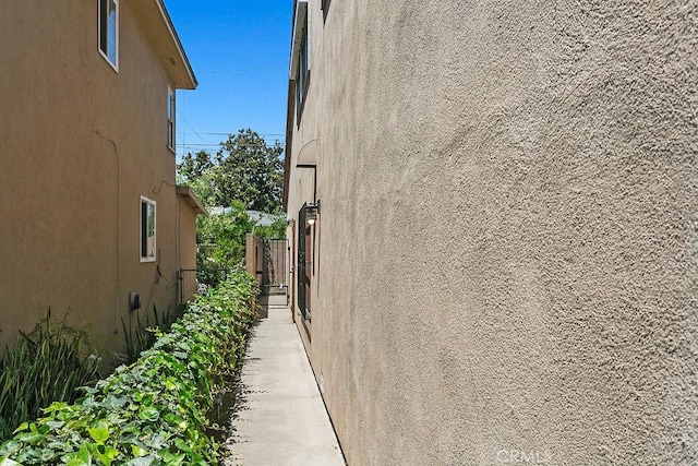 3431 Caspian Ave, Long Beach, CA 90810 - view of side of property featuring stucco siding