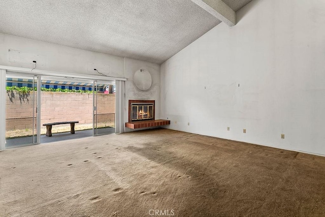 3431 Caspian Ave, Long Beach, CA 90810 - unfurnished living room featuring carpet flooring, a glass covered fireplace, and a textured ceiling
