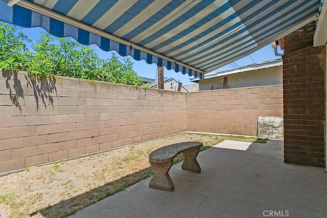 3431 Caspian Ave, Long Beach, CA 90810 - fenced backyard featuring a patio area