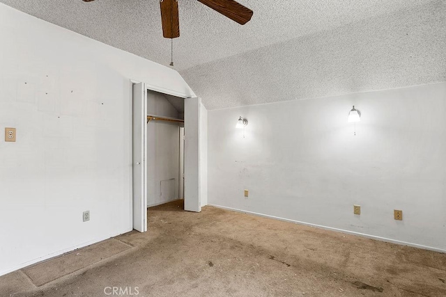 3431 Caspian Ave, Long Beach, CA 90810 - unfurnished bedroom with a textured ceiling, vaulted ceiling, carpet flooring, a closet, and ceiling fan