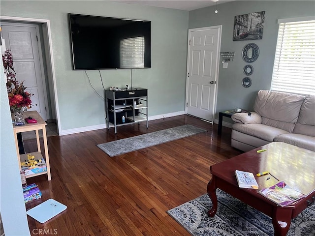 1222 E 103rd St, Los Angeles, CA 90002 - living area featuring baseboards and wood finished floors