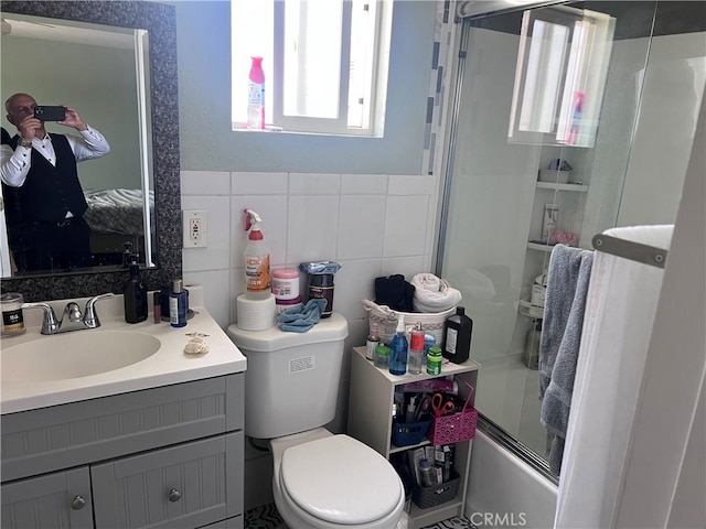 1222 E 103rd St, Los Angeles, CA 90002 - bathroom with vanity and combined bath / shower with glass door
