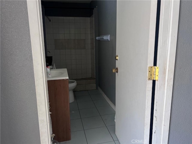 1222 E 103rd St, Los Angeles, CA 90002 - bathroom featuring tile patterned flooring and vanity