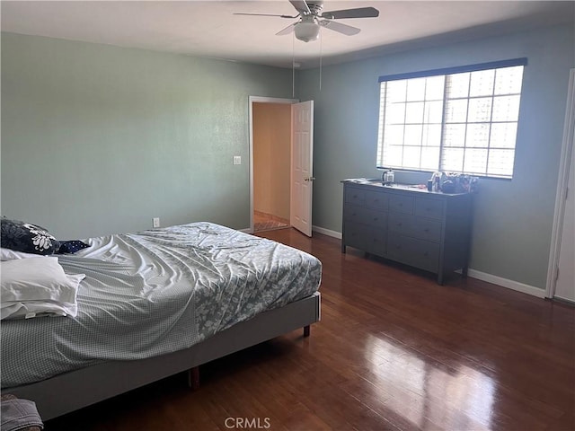 1222 E 103rd St, Los Angeles, CA 90002 - bedroom featuring dark wood finished floors and ceiling fan