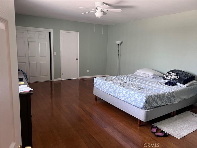 1222 E 103rd St, Los Angeles, CA 90002 - bedroom with dark wood finished floors and ceiling fan
