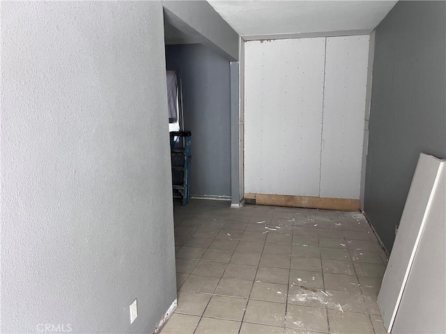 1222 E 103rd St, Los Angeles, CA 90002 - corridor with tile patterned flooring