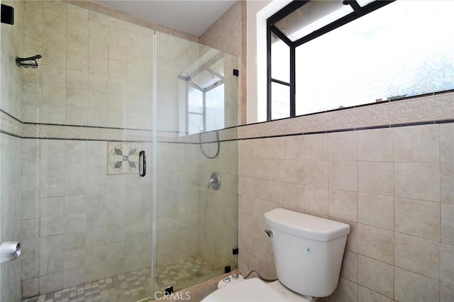 19324 Victory Blvd, Reseda, CA 91335 - bathroom with a shower stall, plenty of natural light, and tile walls