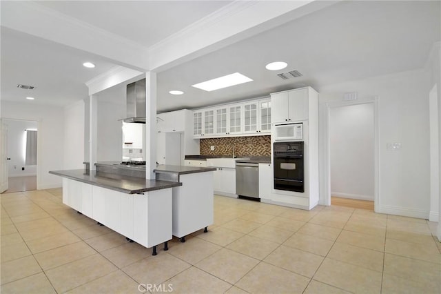 19324 Victory Blvd, Reseda, CA 91335 - kitchen with oven, stainless steel dishwasher, dark countertops, decorative backsplash, and light tile patterned floors