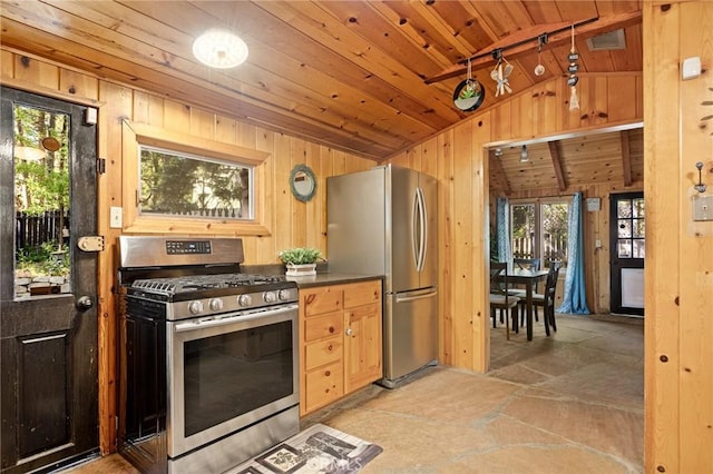 31701 Christmas Tree Ln, Running Springs, CA 92382 - kitchen featuring stainless steel appliances, lofted ceiling, wooden walls, and wooden ceiling