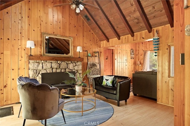31701 Christmas Tree Ln, Running Springs, CA 92382 - living room featuring wood walls, wood finished floors, ceiling fan, a wooden ceiling with exposed beams, and high vaulted ceiling