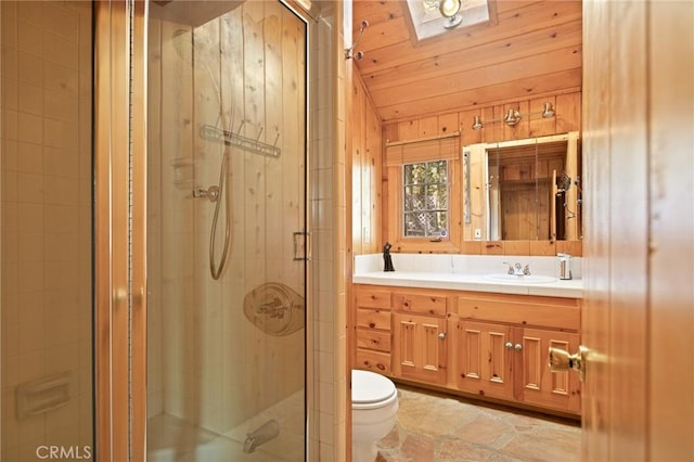 31701 Christmas Tree Ln, Running Springs, CA 92382 - full bath featuring vaulted ceiling, vanity, a stall shower, and stone finish floors