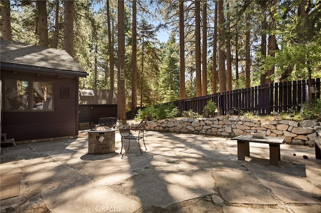 31701 Christmas Tree Ln, Running Springs, CA 92382 - view of patio / terrace featuring an outdoor fire pit