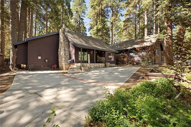 31701 Christmas Tree Ln, Running Springs, CA 92382 - view of front of property featuring a chimney and driveway