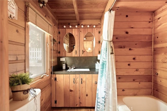 31701 Christmas Tree Ln, Running Springs, CA 92382 - full bath with a wood ceiling with exposed beams, a tub, vanity, and wooden walls