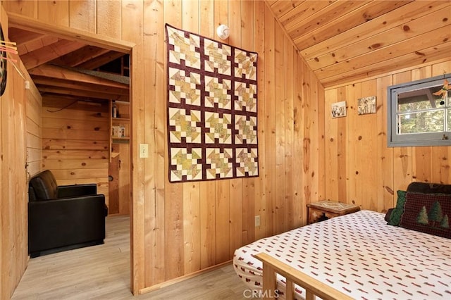 31701 Christmas Tree Ln, Running Springs, CA 92382 - bedroom featuring vaulted ceiling, wooden walls, and light wood-type flooring